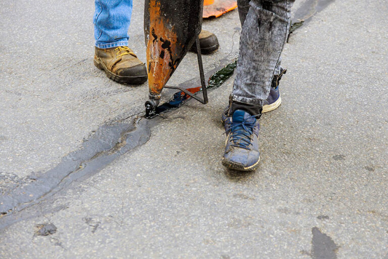 Asphalt Cracked, Mack Seal LLC