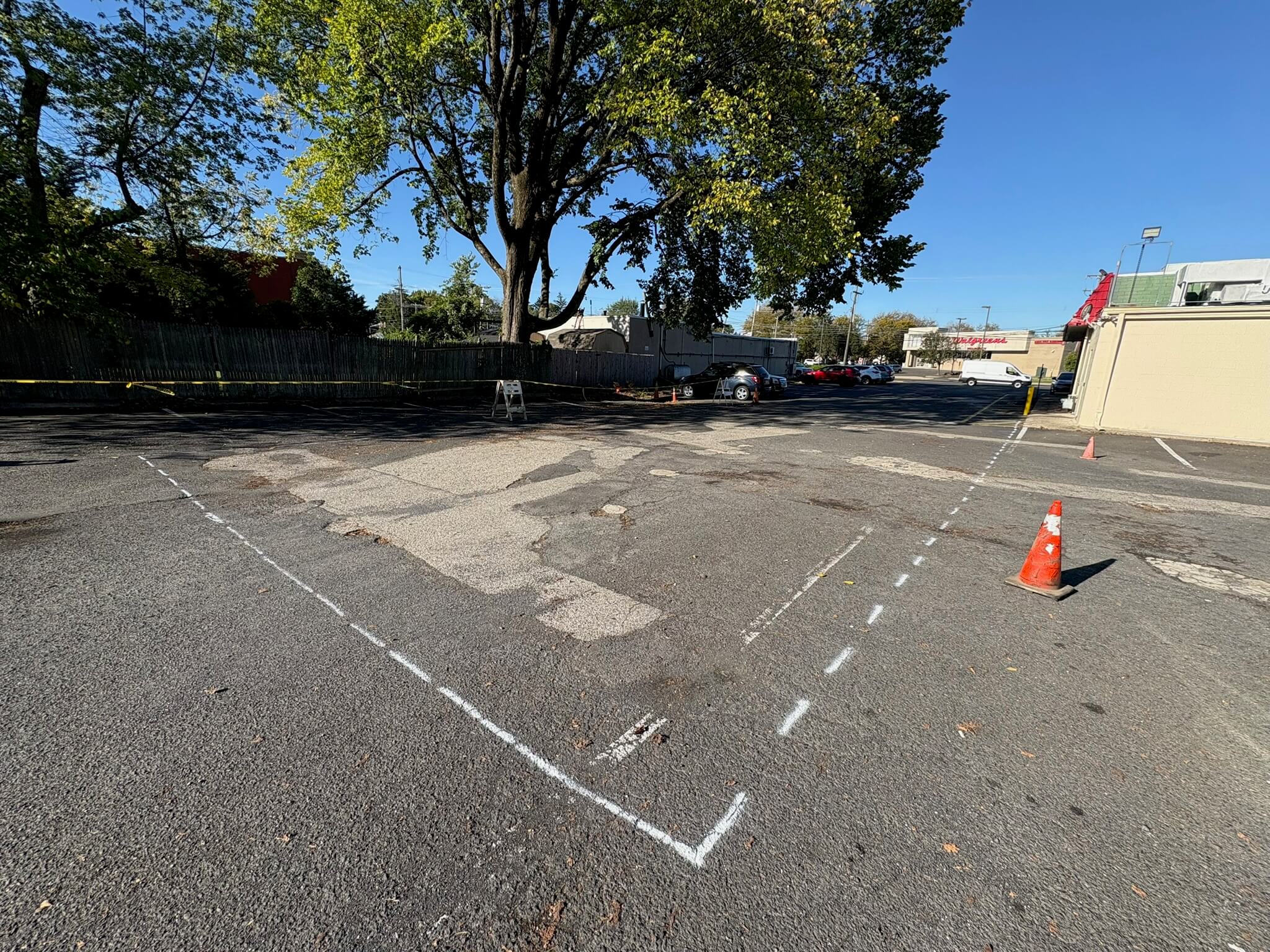 Before asphalt repair — pothole damaged pavement Warrington PA